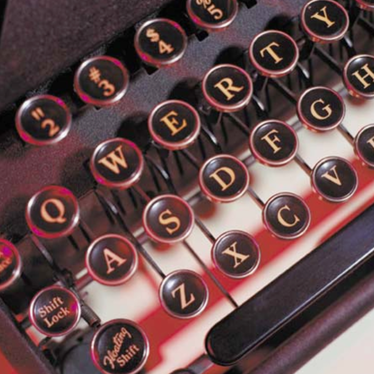 Close up image of the keys on a vintage typewriter