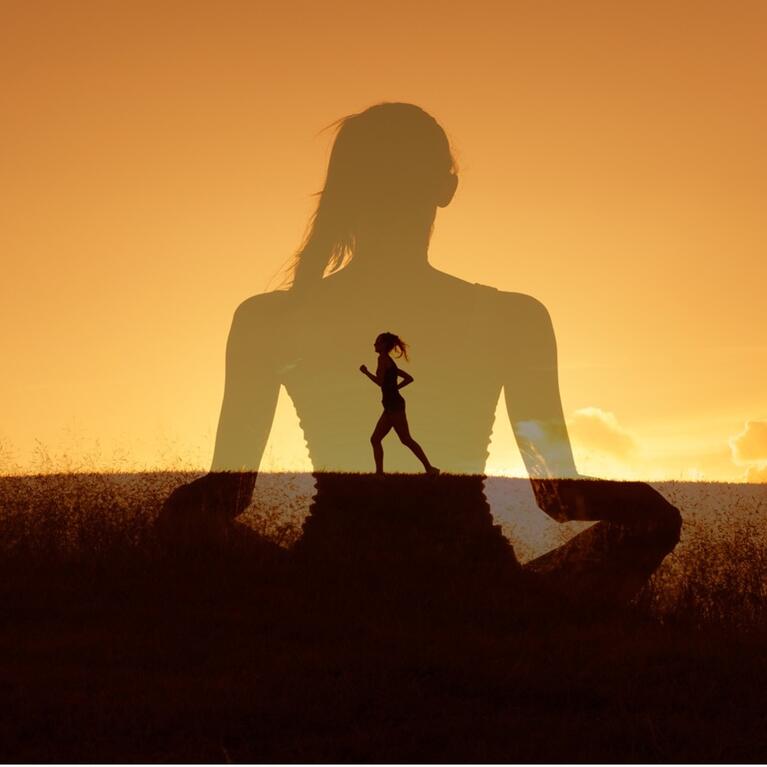 silhouette of a woman running in a larger silhouette of a woman sitting with legs crossed