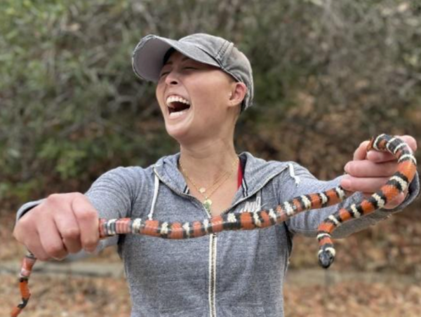 Picture of Allyn Nguyen holding a snake