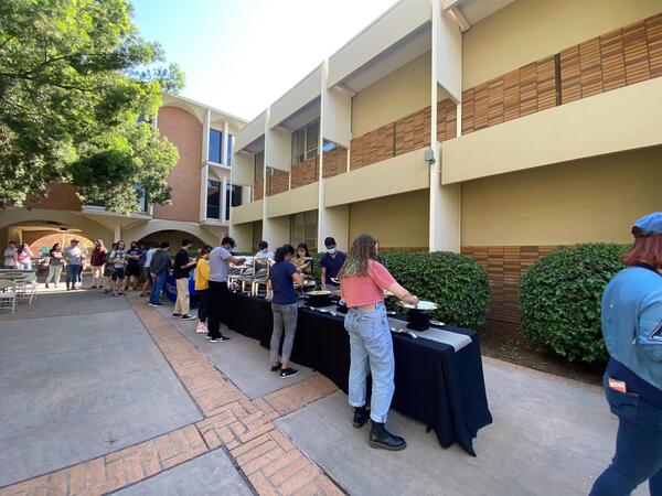 Graduate Students lined up to get food during Stress Relief Fair.