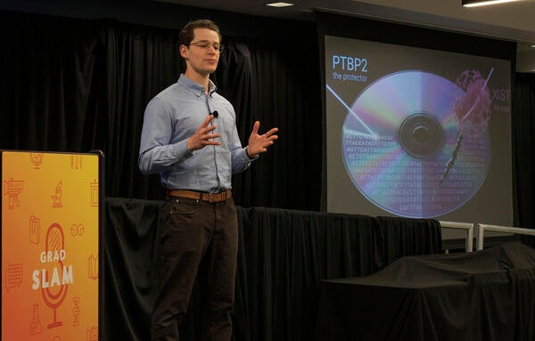 David Nikom with slide