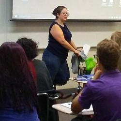 Woman teaching class