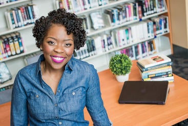 Dr. Shardé Davis smiling at the camera